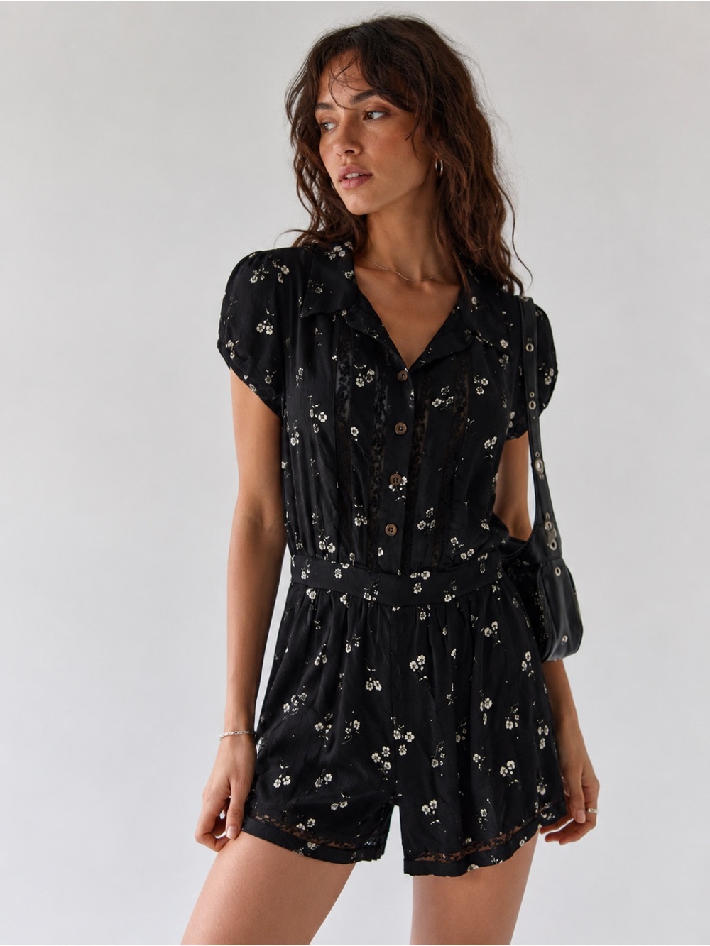 Urban Outfitters Cooperative
Black White Floral Romper lace inserts